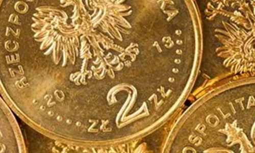 A close-up image showing several Polish 2 złote coins with an eagle emblem, the date "2013", and the text "RZECZPOSPOLITA POLSKA" visible.